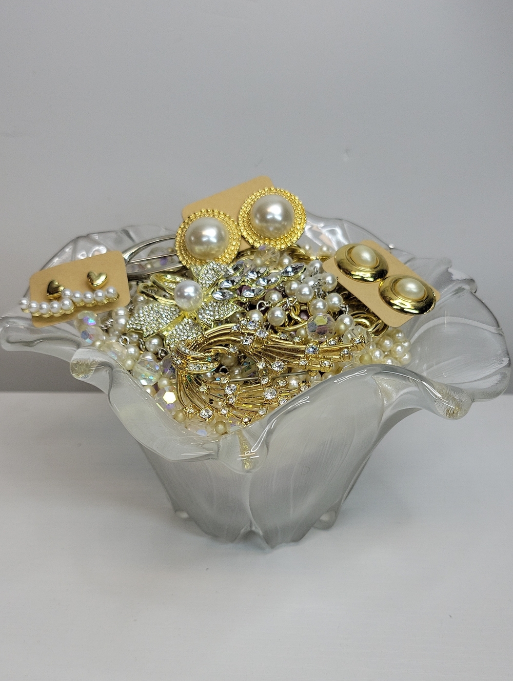 Decorative Glass Dish Filled With Jewelry